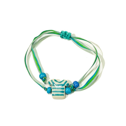 Pulsera camiseta (Turquesa)